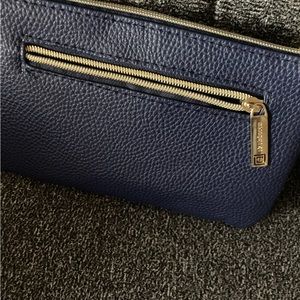 Liz Claiborne blue wristlet with built in power bank